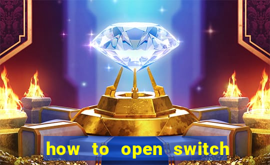 how to open switch oled game card slot