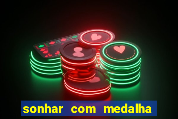 sonhar com medalha de santo